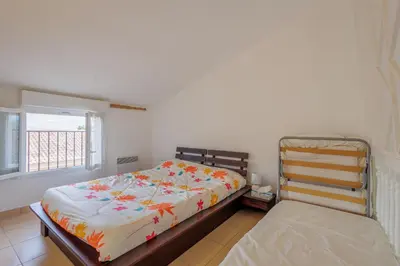 Un ou plusieurs lits dans un hébergement de l'établissement Jaso - Maison à 5min de la plage