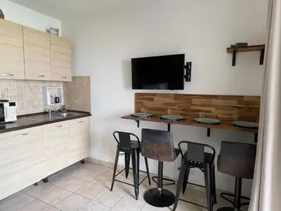Cuisine ou kitchenette dans l'établissement Carpediem-corsica Bravone