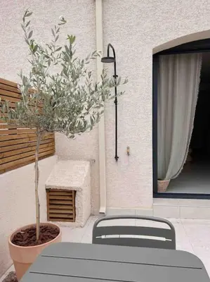 Un ou plusieurs lits dans un hébergement de l'établissement LA GRANDE JANE petite villa bord de mer