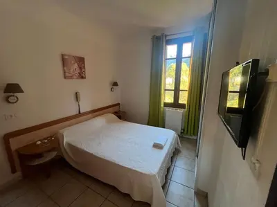 Un ou plusieurs lits dans un hébergement de l'établissement Appartement 2 chambres pour 6 personnes en résidence à la nuitée