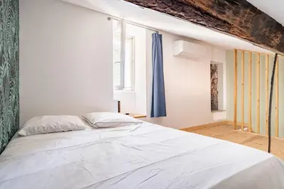 Un ou plusieurs lits dans un hébergement de l'établissement Citadelle de Bastia - duplex - vue mer