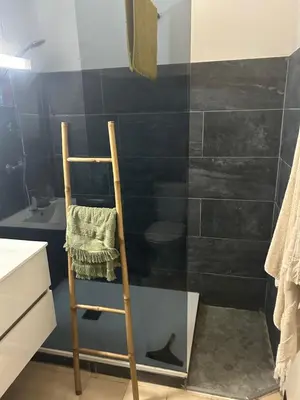 Salle de bains dans l'établissement Studio meublé bord de mer