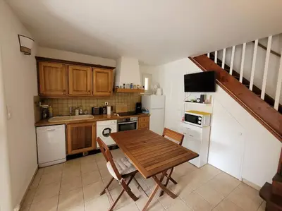 Cuisine ou kitchenette dans l'établissement Maison au bord de la mer