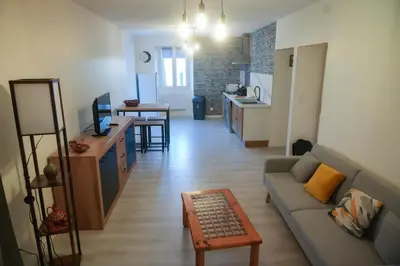 Coin salon dans l'établissement Location F2 44 m2