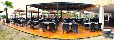 Restaurant ou autre lieu de restauration dans l'établissement Bungalow on the sea - Moriani beach