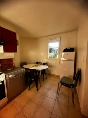 Cuisine ou kitchenette dans l'établissement Résidence KALLISTE