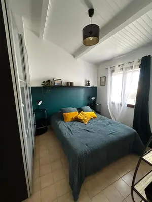 Un ou plusieurs lits dans un hébergement de l'établissement Maison bord de mer en Corse
