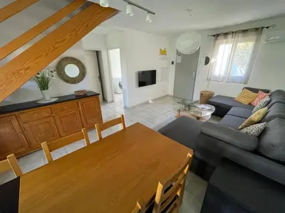 Télévision ou salle de divertissement dans l'établissement Casabella 3 chambres