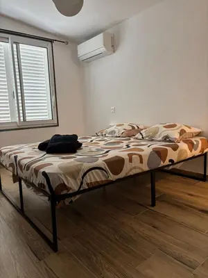 Un ou plusieurs lits dans un hébergement de l'établissement Casa Straboni Corte