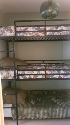Un ou plusieurs lits superposés dans un hébergement de l'établissement Appartement 5 couchages à Calvi