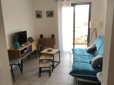 Télévision ou salle de divertissement dans l'établissement Appartement Le grand large Proche plage & ville