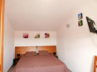 Un ou plusieurs lits dans un hébergement de l'établissement Villa bord de mer,3 chambres, piscine chauffée, climatisée