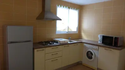Cuisine ou kitchenette dans l'établissement In Tavignanu