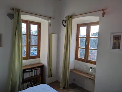 Un ou plusieurs lits dans un hébergement de l'établissement Maison de charme