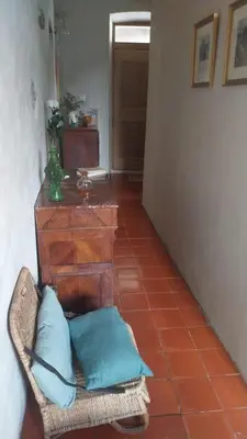 Coin salon dans l'établissement Maison de Caractère au coeur du village