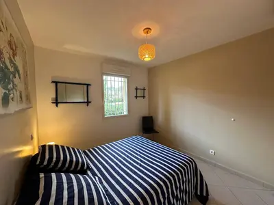 Un ou plusieurs lits dans un hébergement de l'établissement Appartement T2 Eucalyptus L'ILE-ROUSSE