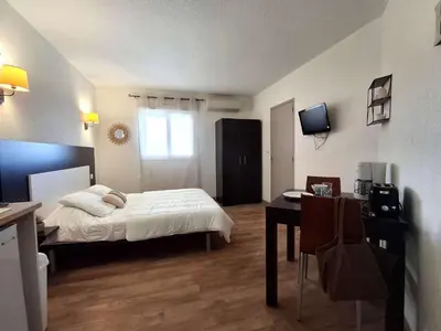 Télévision ou salle de divertissement dans l'établissement Studio avec piscine SAINT FLORENT - FLO300-259