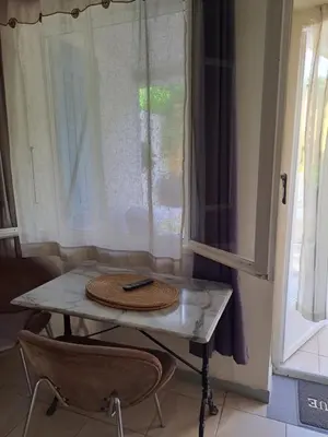 Coin salon dans l'établissement Appartements Luccisano