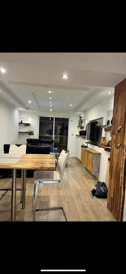 Cuisine ou kitchenette dans l'établissement Très bel appartement