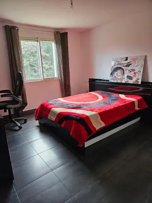 Un ou plusieurs lits dans un hébergement de l'établissement Maison de village