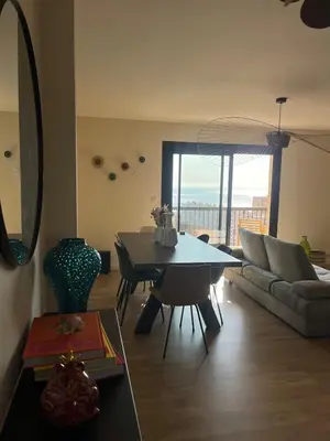 Coin salon dans l'établissement Appartement Mare Vista
