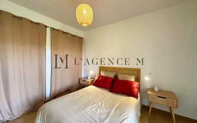 Un ou plusieurs lits dans un hébergement de l'établissement Appartement Lugaro Paisible & charmant