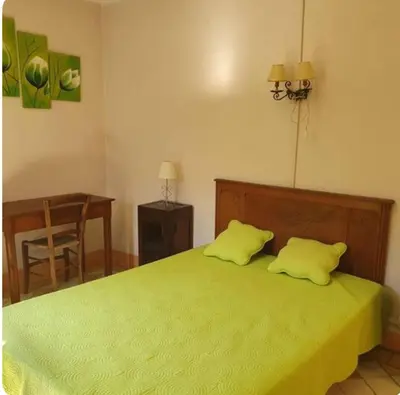 Un ou plusieurs lits dans un hébergement de l'établissement Appartement Caprunale Rivière & Maquis