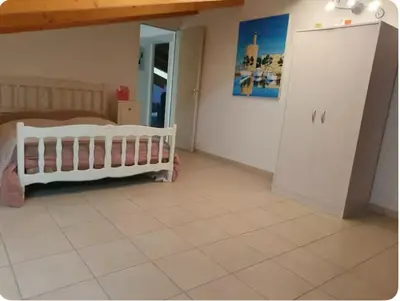 Un ou plusieurs lits dans un hébergement de l'établissement Appartement Paglia Orba Rivière & maquis