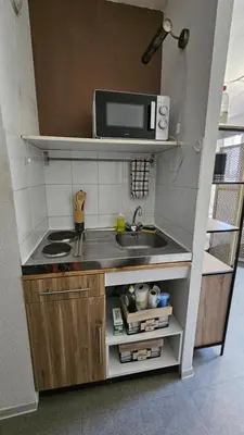 Cuisine ou kitchenette dans l'établissement Studio Gare Corte