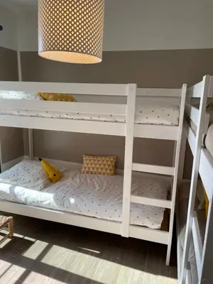 Un ou plusieurs lits dans un hébergement de l'établissement Villa Petrera