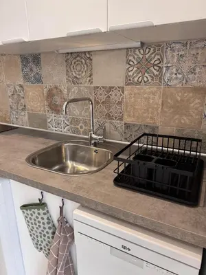 Cuisine ou kitchenette dans l'établissement Appartement au cœur du village