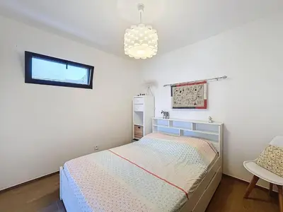 Un ou plusieurs lits dans un hébergement de l'établissement T2 moderne en rez-de-villa