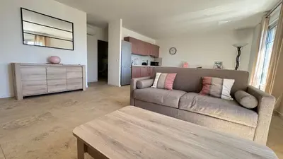 Coin salon dans l'établissement Appartement Rosa Mare