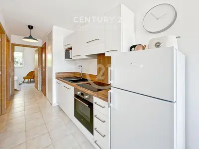 Cuisine ou kitchenette dans l'établissement Calvi T2 les Jasmins proche centre