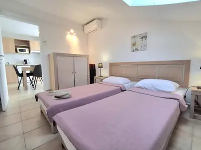 Un ou plusieurs lits dans un hébergement de l'établissement Villas MELODY - Appartement climatisé 4/6 pers