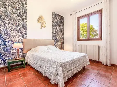 Un ou plusieurs lits dans un hébergement de l'établissement Holiday Home Casa Féminiccia by Interhome