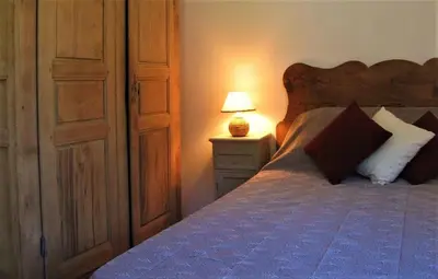 Un ou plusieurs lits dans un hébergement de l'établissement Maison de caractère spacieuse et confortable, grand jardin , superbes vues