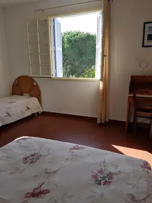 Un ou plusieurs lits dans un hébergement de l'établissement Appartement 1 plaine du Reginu, Speloncato pour 3 personnes