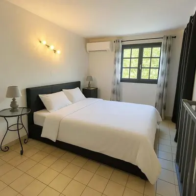 Un ou plusieurs lits dans un hébergement de l'établissement Appartement calme proche du centre