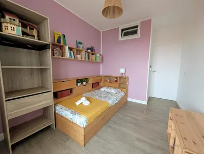 Un ou plusieurs lits dans un hébergement de l'établissement Appartement familial - Vue mer