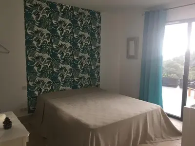Un ou plusieurs lits dans un hébergement de l'établissement Belle maison en Balagne