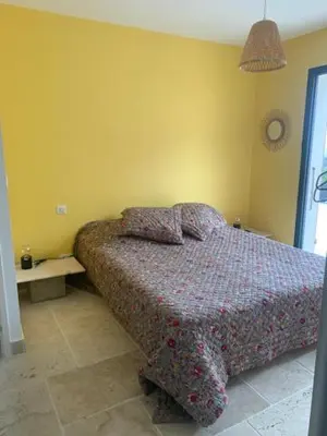 Un ou plusieurs lits dans un hébergement de l'établissement Belle maison en Balagne