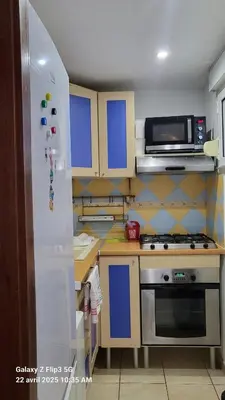 Cuisine ou kitchenette dans l'établissement appartement bords de Mer