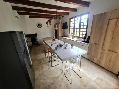 Cuisine ou kitchenette dans l'établissement Maison - chambres d'hotes