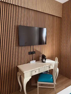 Télévision ou salle de divertissement dans l'établissement Maison Bonaparte