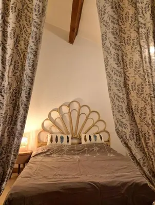 Un ou plusieurs lits dans un hébergement de l'établissement Appartement calme & cosy vue montagne