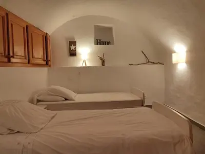 Un ou plusieurs lits dans un hébergement de l'établissement Les voûtes de Pascaline, vue mer et montagne, Lama