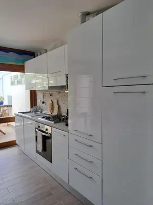Cuisine ou kitchenette dans l'établissement Vaccagia - 2 chambres - a 2 pas de la plage