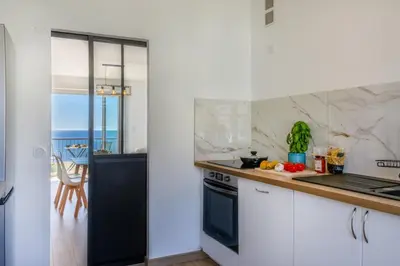 Cuisine ou kitchenette dans l'établissement Casa des Iles