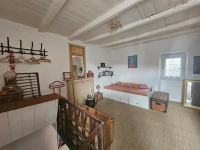 Un ou plusieurs lits dans un hébergement de l'établissement Jolie maison de village- Cap Corse Pietracorbara